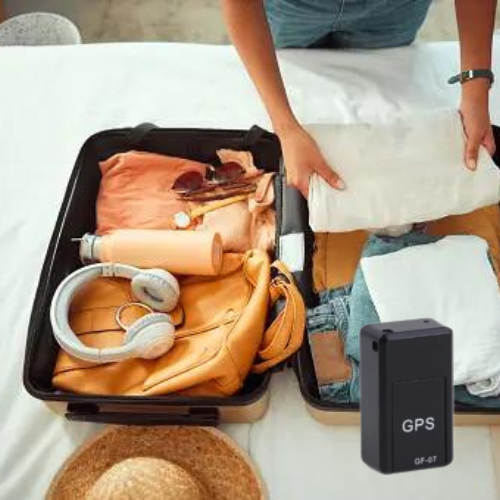 Image of a suitcase being packed and the GPS MiniTracker init